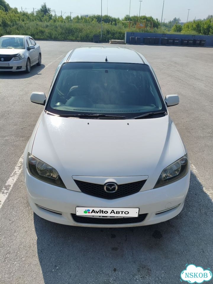 Mazda Demio 1.4 AT, 2004, 235 985 км фото 11