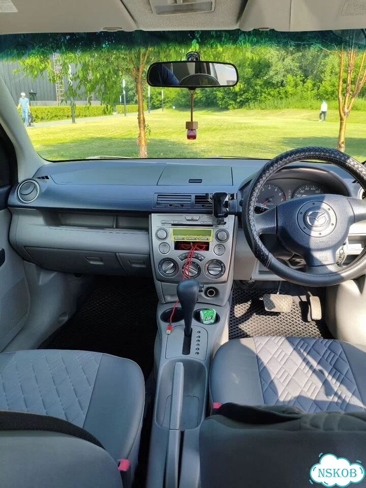 Mazda Demio 1.4 AT, 2004, 235 985 км фото 6