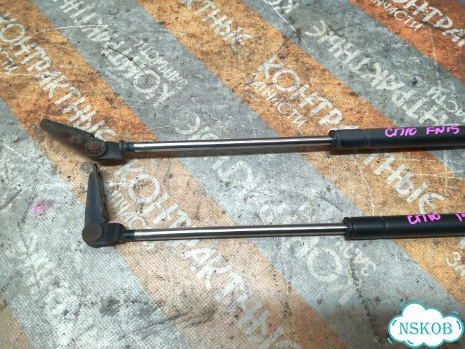 Амортизатор задней двери Nissan Pulsar FN15 GA15E фото 4