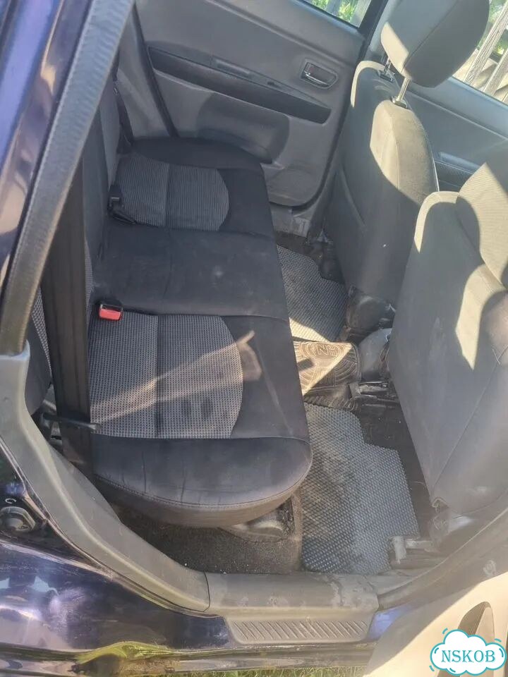 Mazda Demio 1.4 AT, 2005, 286 353 км фото 12