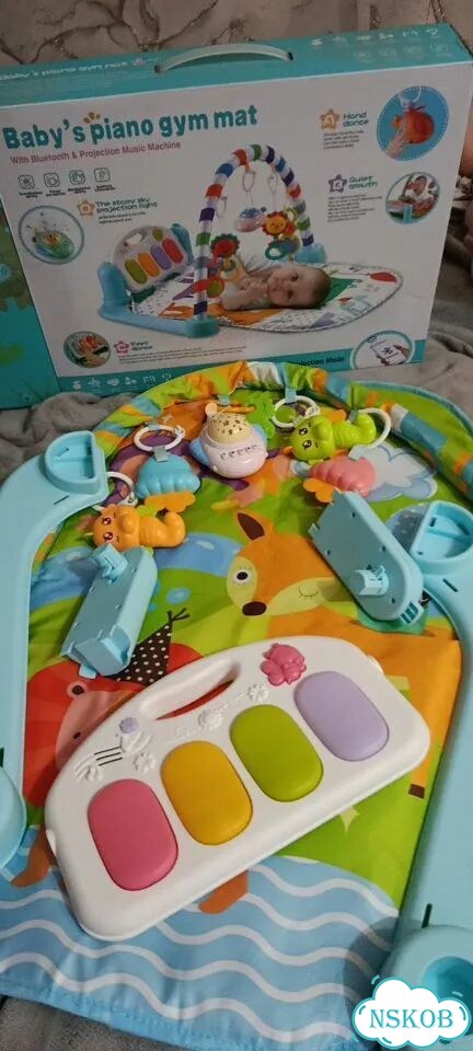 Развивающий коврик пианино и игрушки фото 1