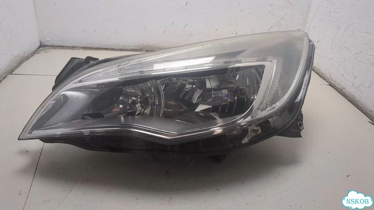 Фара (передняя) левая Opel Astra J фото 1