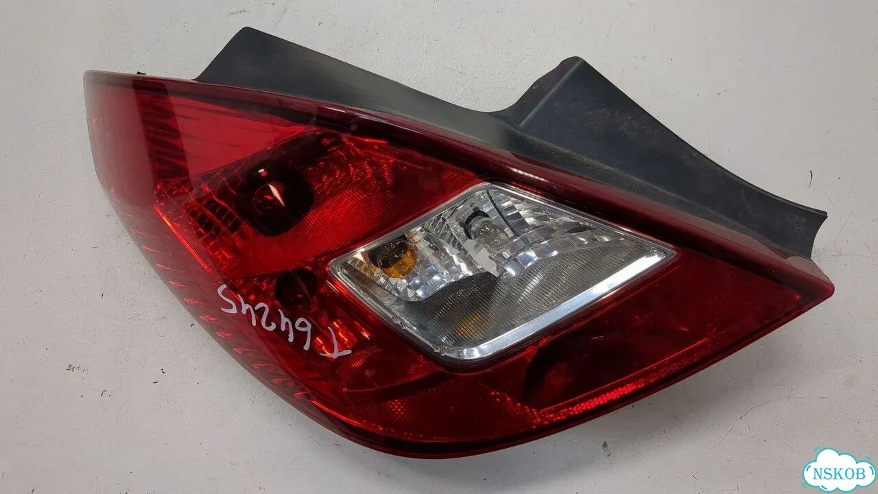 Фонарь (задний) левый Opel Corsa D фото 1