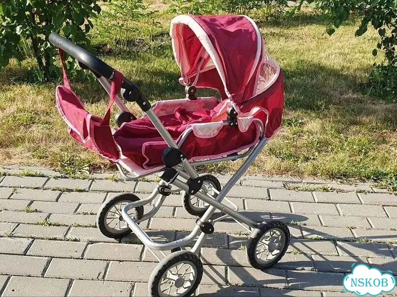 Игрушечная коляска для кукол фото 1