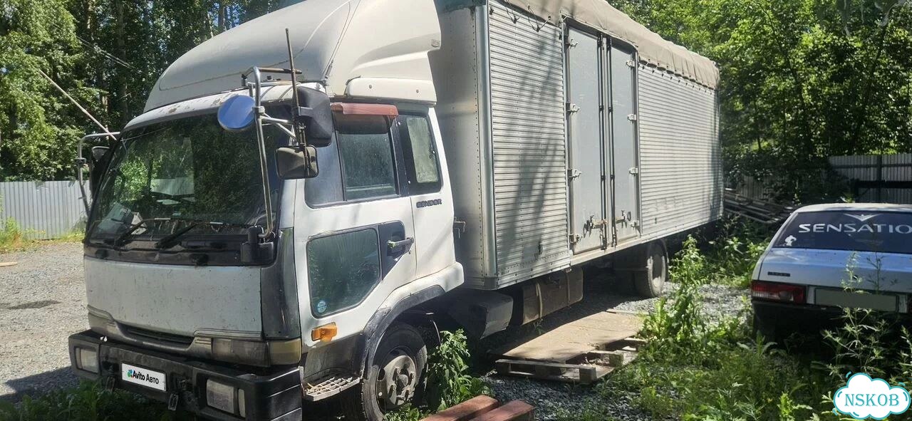 Промтоварный фургон 50 м³ Nissan Diesel Condor, 1997 фото 1