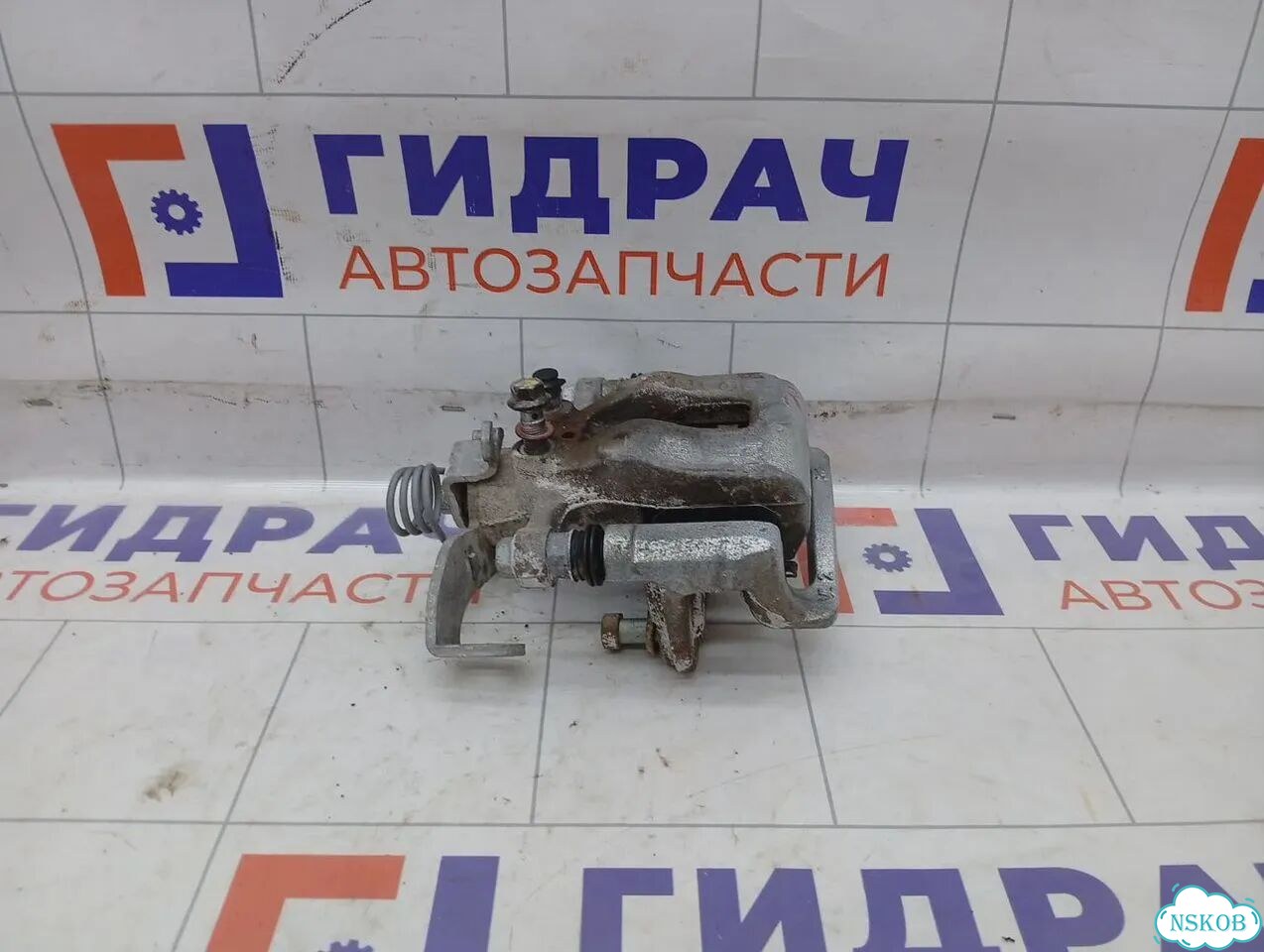 Суппорт тормозной (24 т.км.) задний правый Kia Rio X-line 58410H0A00 фото 2