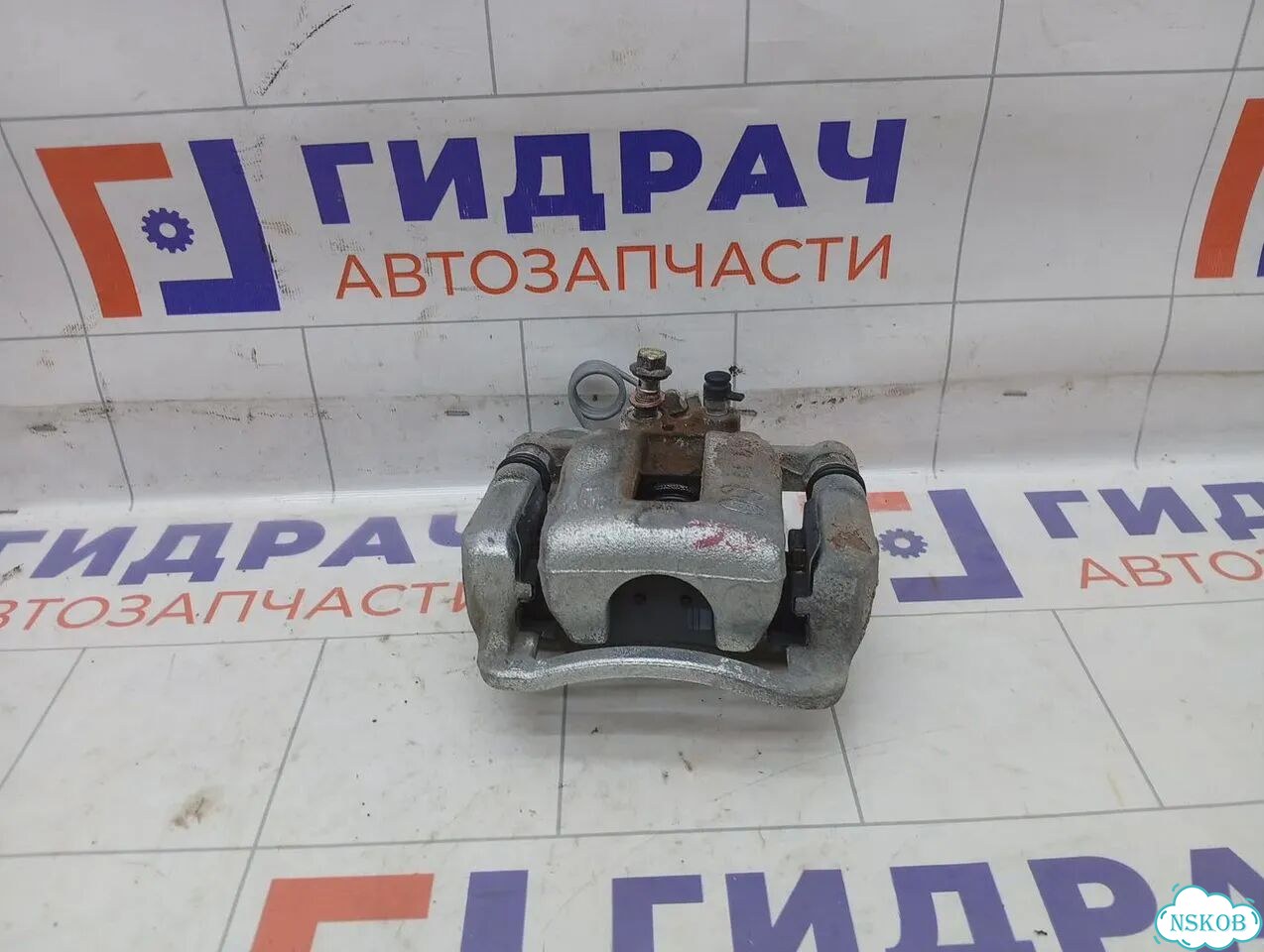 Суппорт тормозной (24 т.км.) задний правый Kia Rio X-line 58410H0A00 фото 3