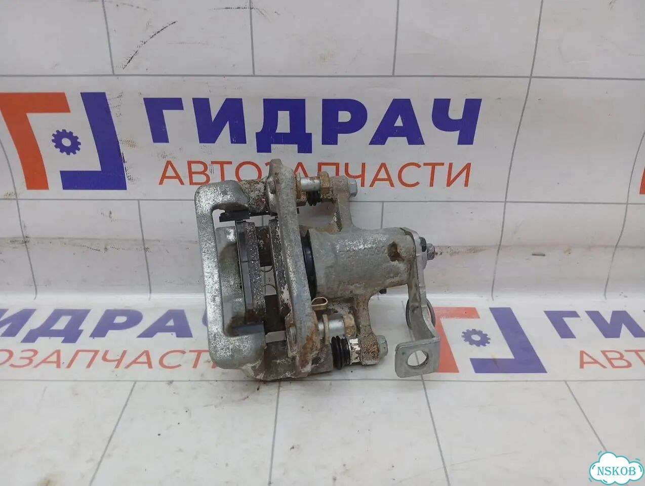Суппорт тормозной (24 т.км.) задний правый Kia Rio X-line 58410H0A00 фото 4