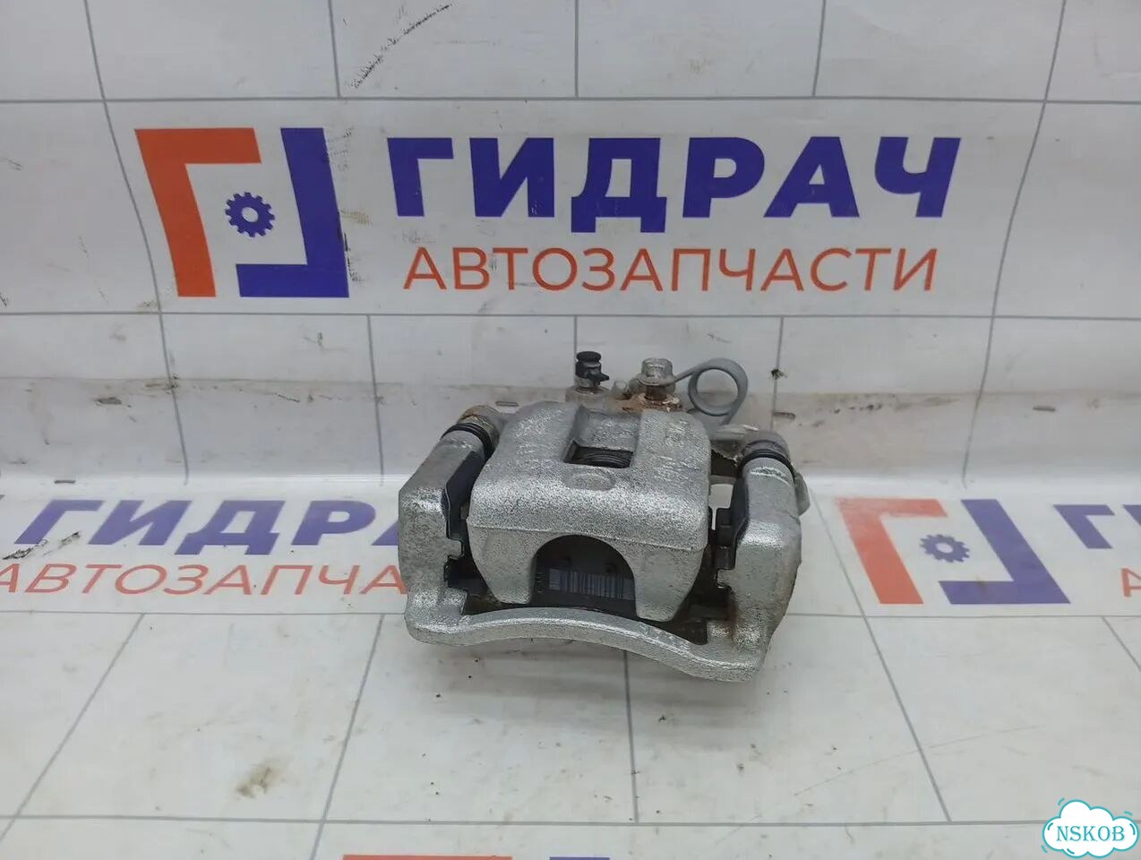 Суппорт тормозной (24 т.км.) задний левый Kia Rio X-line 58310H0A00 фото 2