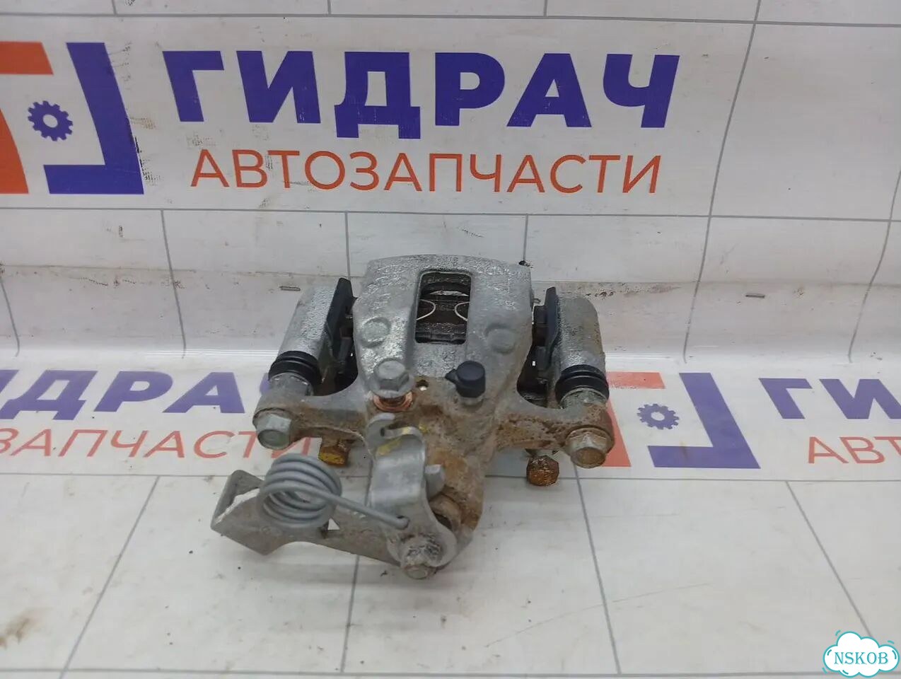 Суппорт тормозной (24 т.км.) задний левый Kia Rio X-line 58310H0A00 фото 3