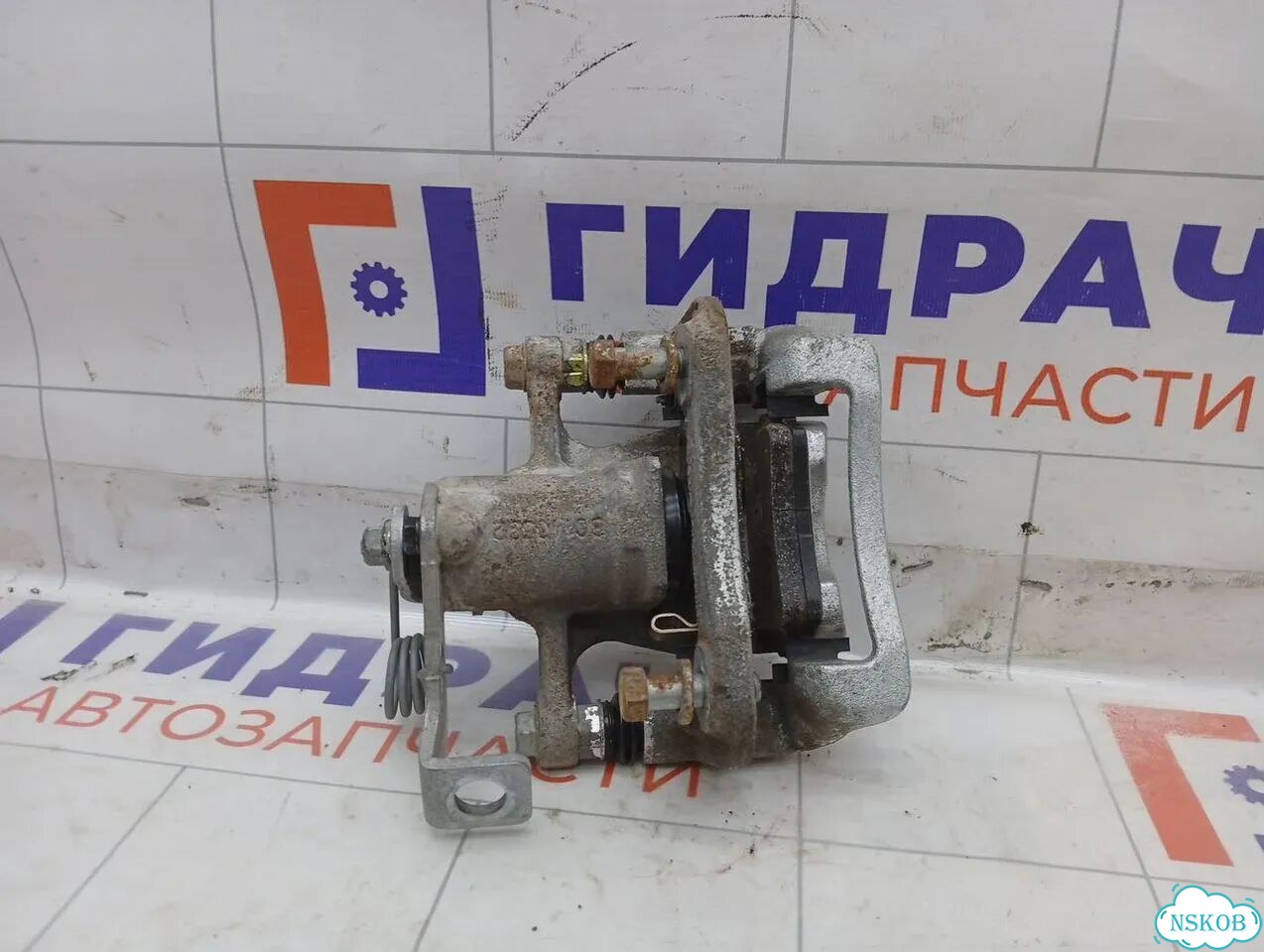 Суппорт тормозной (24 т.км.) задний левый Kia Rio X-line 58310H0A00 фото 4