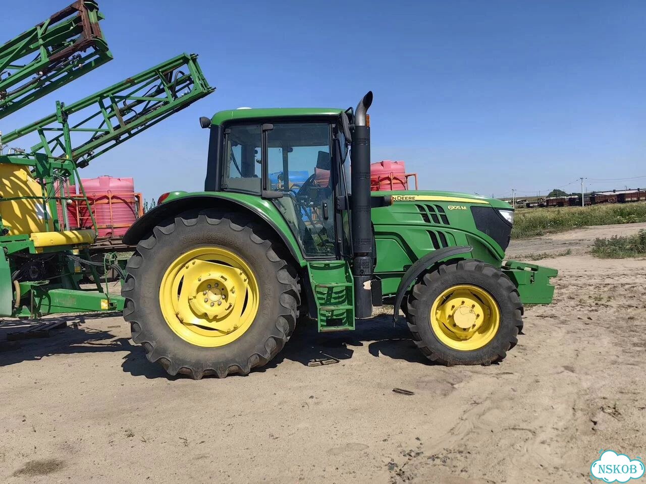 Трактор John Deere 6105E, 2012 фото 1