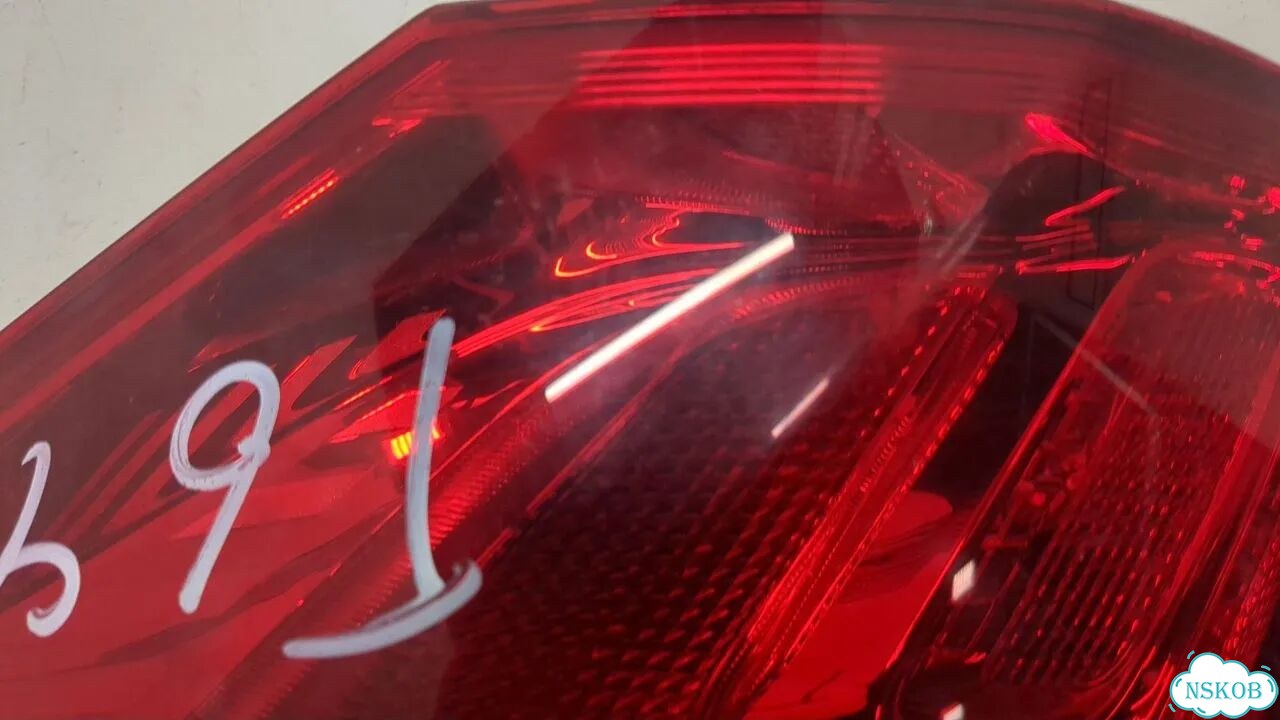 Фонарь (задний) левый Opel Astra J фото 2