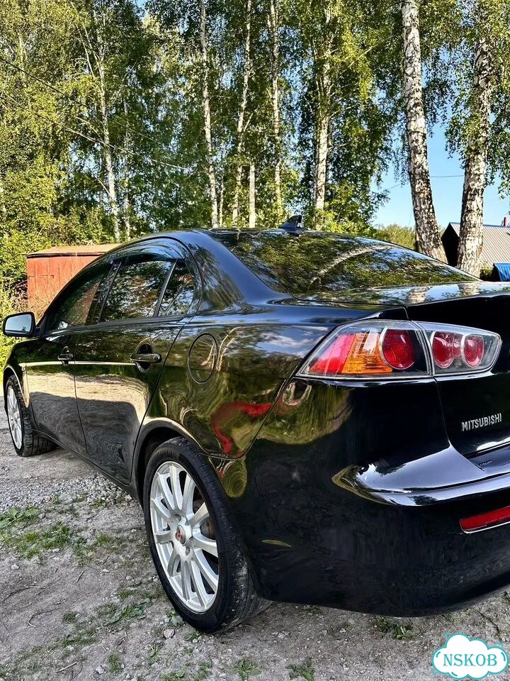 Mitsubishi Lancer 1.6 AT, 2013, 144 900 км фото 12