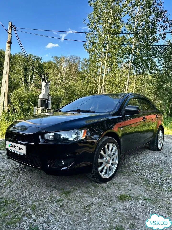 Mitsubishi Lancer 1.6 AT, 2013, 144 900 км фото 4