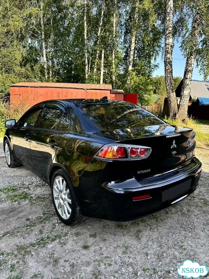 Mitsubishi Lancer 1.6 AT, 2013, 144 900 км фото 8