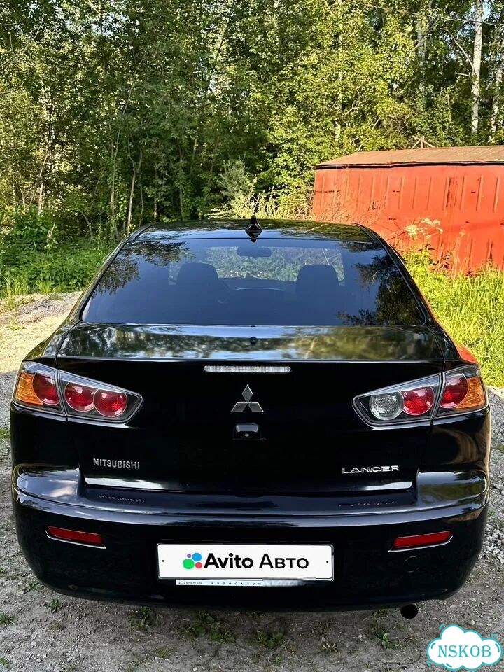 Mitsubishi Lancer 1.6 AT, 2013, 144 900 км фото 9