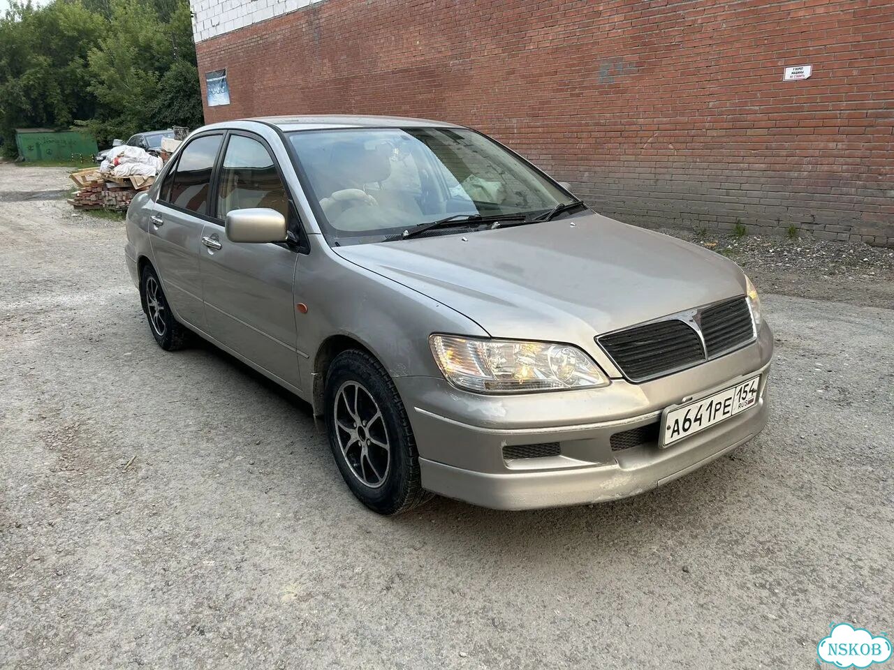 Аренда автомобиля Mitsubishi Lancer 2001г.в фото 1