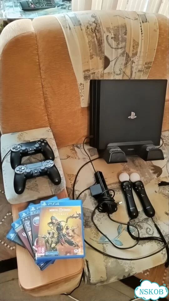 Игровая приставка ps4 с играми с дисками фото 2