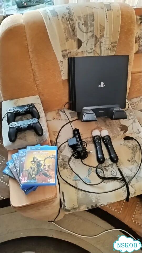 Игровая приставка ps4 с играми с дисками фото 3