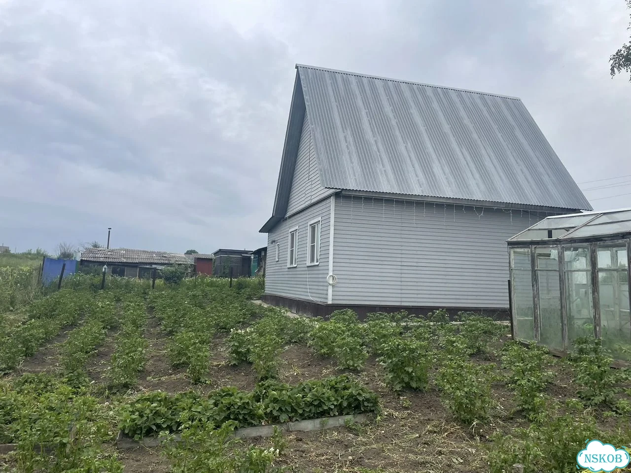 Дом 56,6 м² на участке 5,5 сот. фото 1