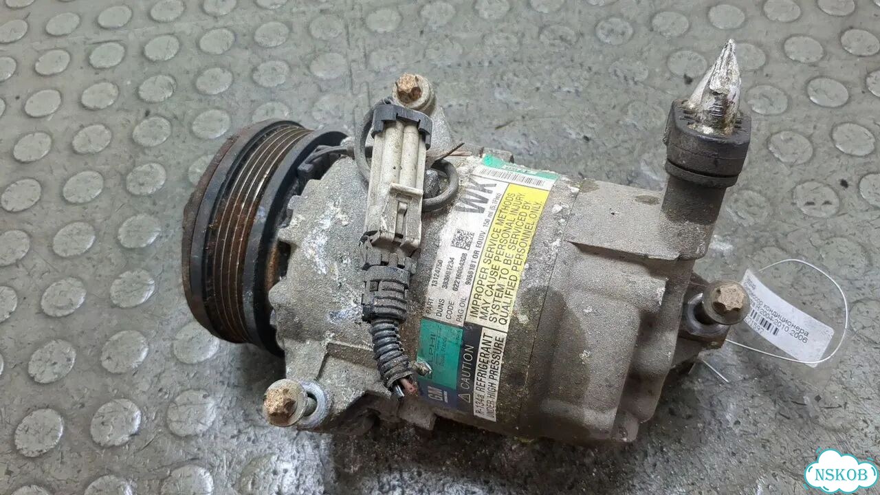 Компрессор кондиционера Opel Astra H фото 1