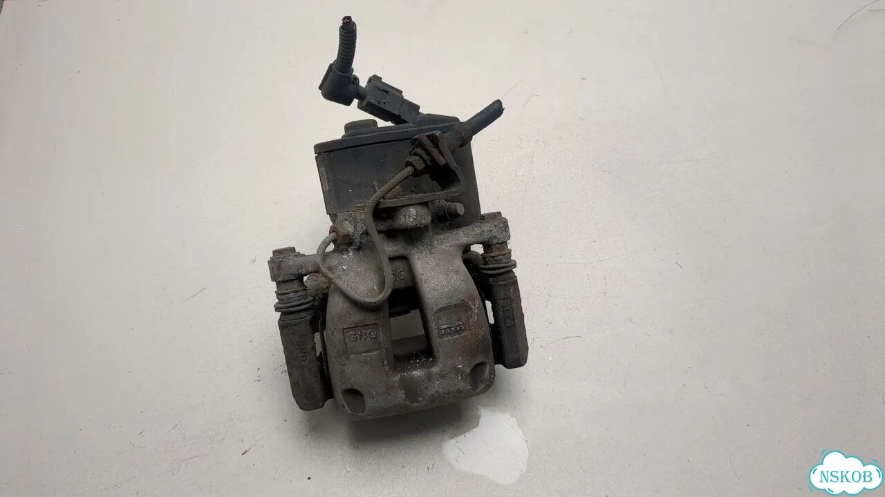 Суппорт левый задний Volkswagen Passat 6 фото 1
